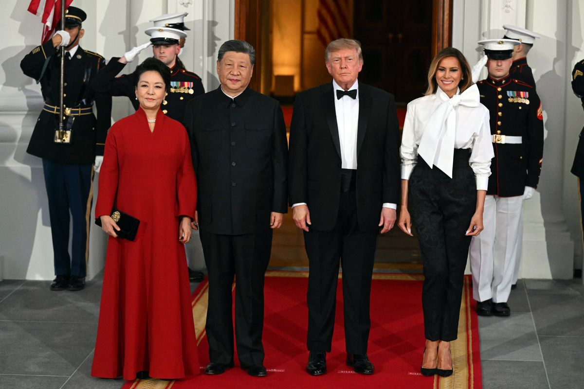 China's First Lady Peng Liyuan, China's President Xi Jinping, US President Donald Trump, and US First Lady Melania Trump pose on the North Portico steps of the White House ahead of a September 2026 State Dinner