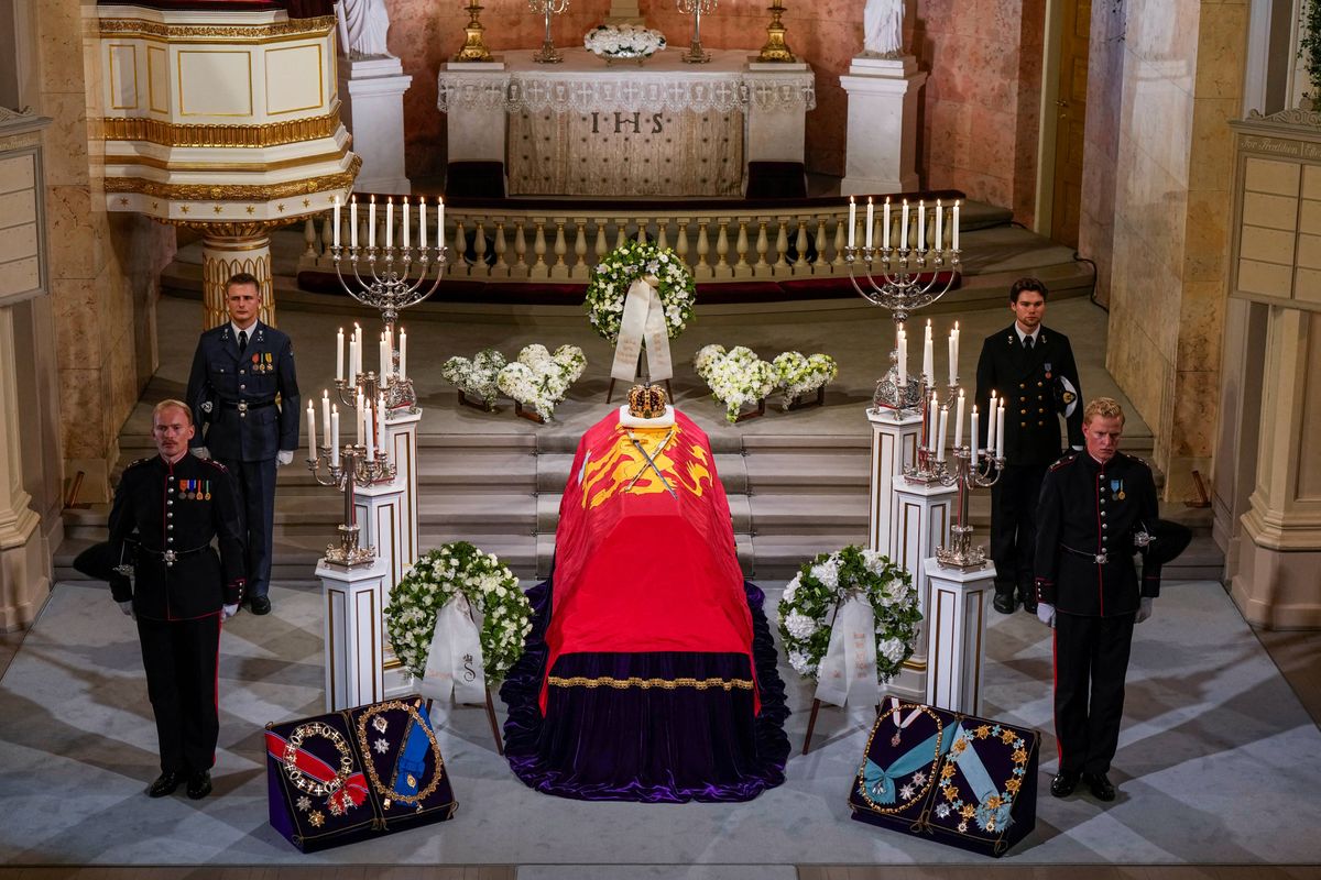 The casket of King Harald V of Norway with the Royal Regalia of Norway, the King's Crown and the Sword of the Realm resting on top, is pictured as the late monarch lies in state at the Royal Palace Chapel in Oslo on August 31, 2026. 