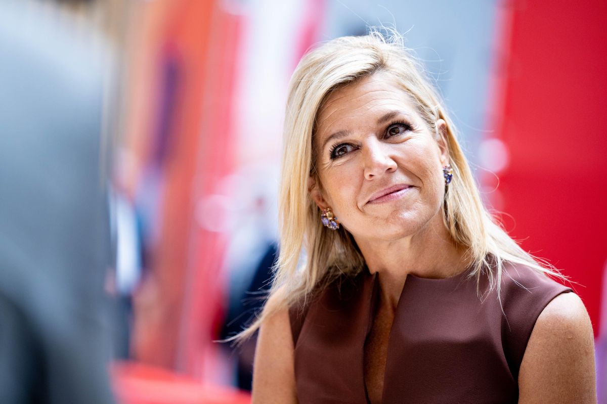 Queen Máxima steps out in chocolate brown and soft pink for an unexpected fall pairing in Amsterdam