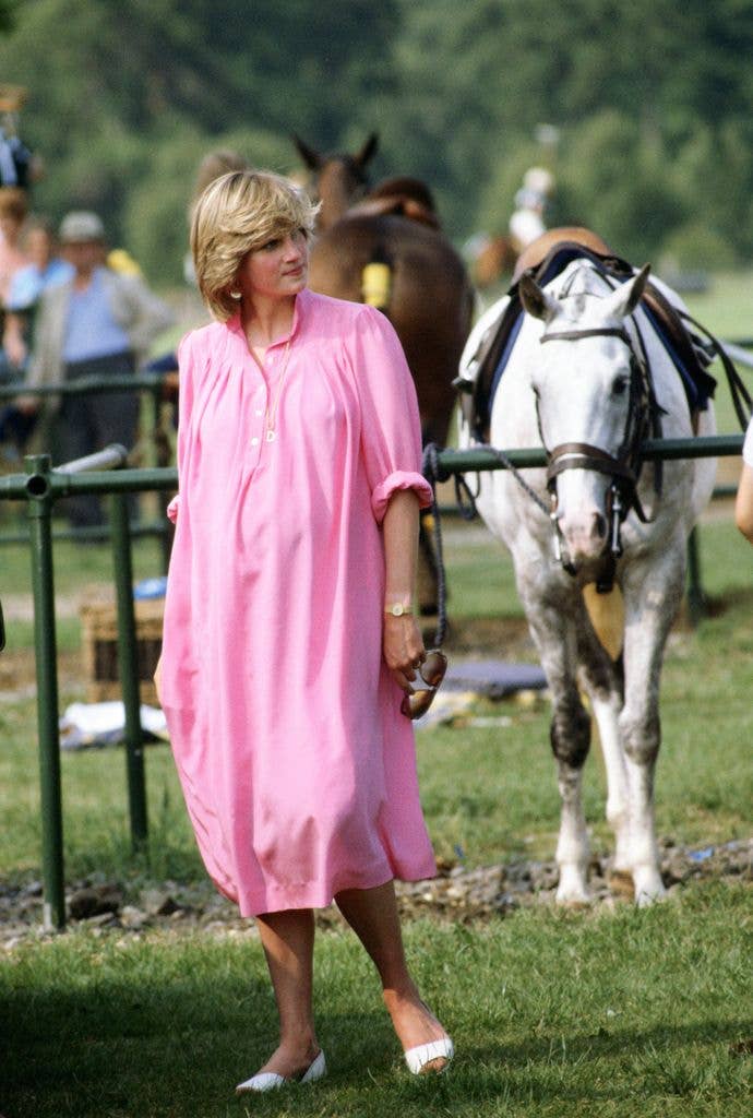 Princess Diana wearing a long pink dress