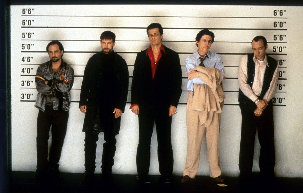 Kevin Pollak, Stephen Baldwin, Benicio Del Toro, Gabriel Byrne and Kevin Spacey line up in a scene from the film 'The Usual Suspects', 1995.