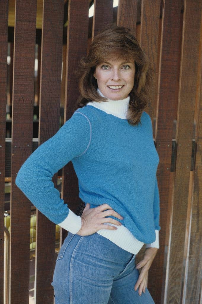 Linda Grey wearing a blue top 