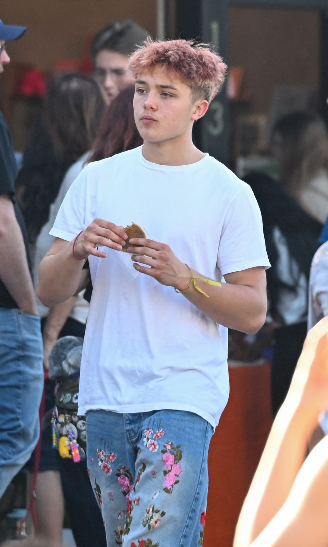 Knox opted for jeans with a floral print in support of his sister