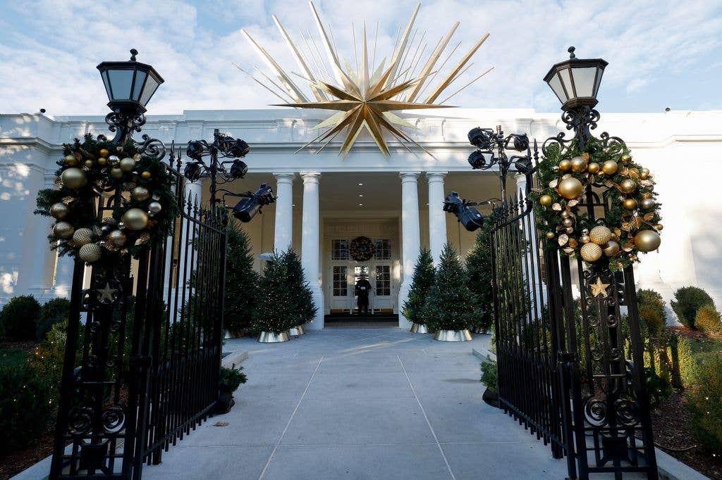 Holiday decorations are seen surrounding the East Wing entrance of the White House during a media preview of the 2024 holiday decorations on December 02, 2024 in Washington, DC