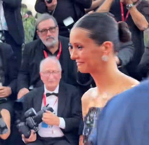 Nina Dobrev smiling on Venice International Film Festival red carpet