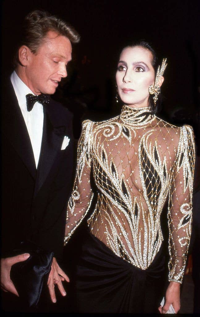 Designer Bob Mackie and Cher attending the 1985 Met Gala
