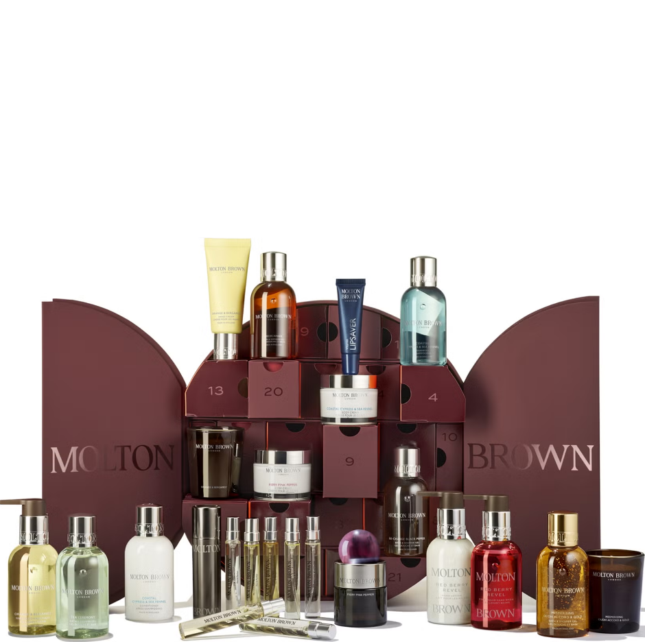 molton brown advent calendar, a collection of beauty products displayed in a decorative box with various bottles and containers.