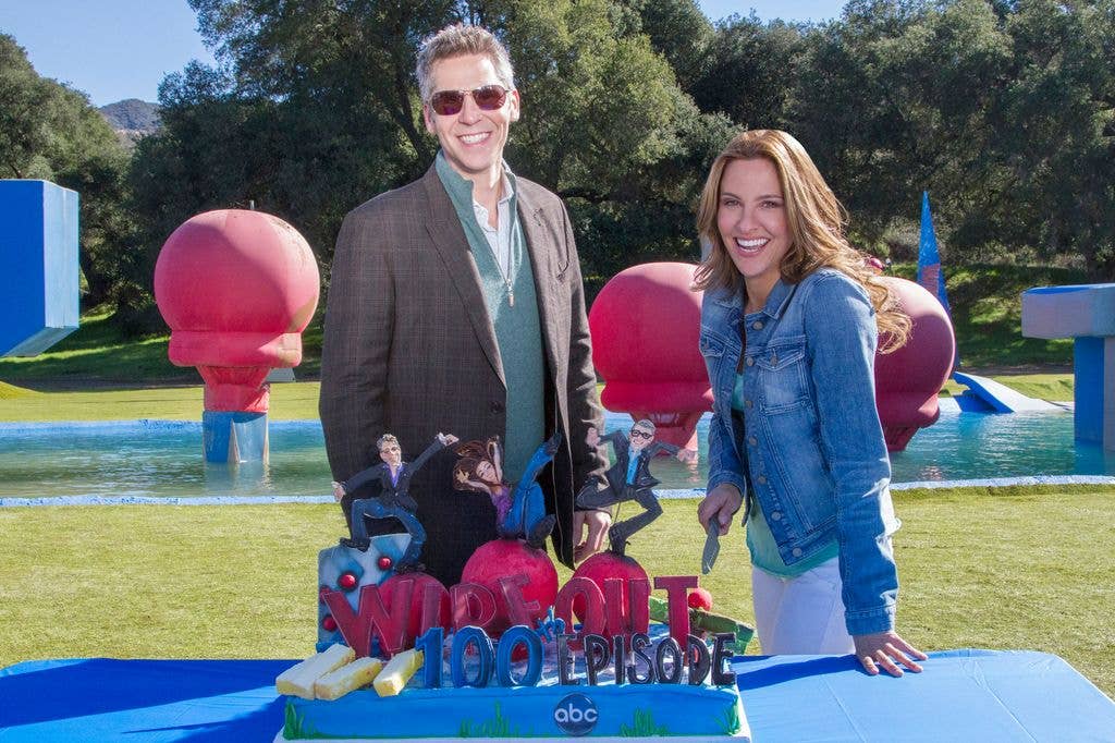 Jill in front of the Wipeout course with John Henson