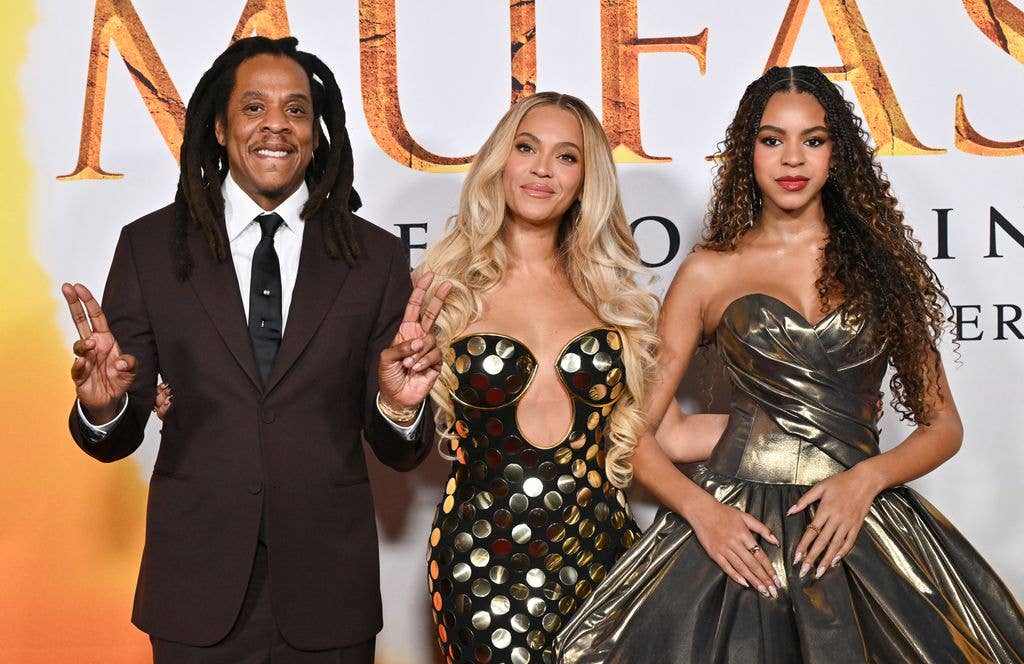 US rapper Jay Z, singer-songwriter Beyonce and their daughter Blue Ivy Carter attend the world premiere of Disney's "Mufasa: The Lion King" at the Dolby theater in Hollywood, California, December 9, 2024. 