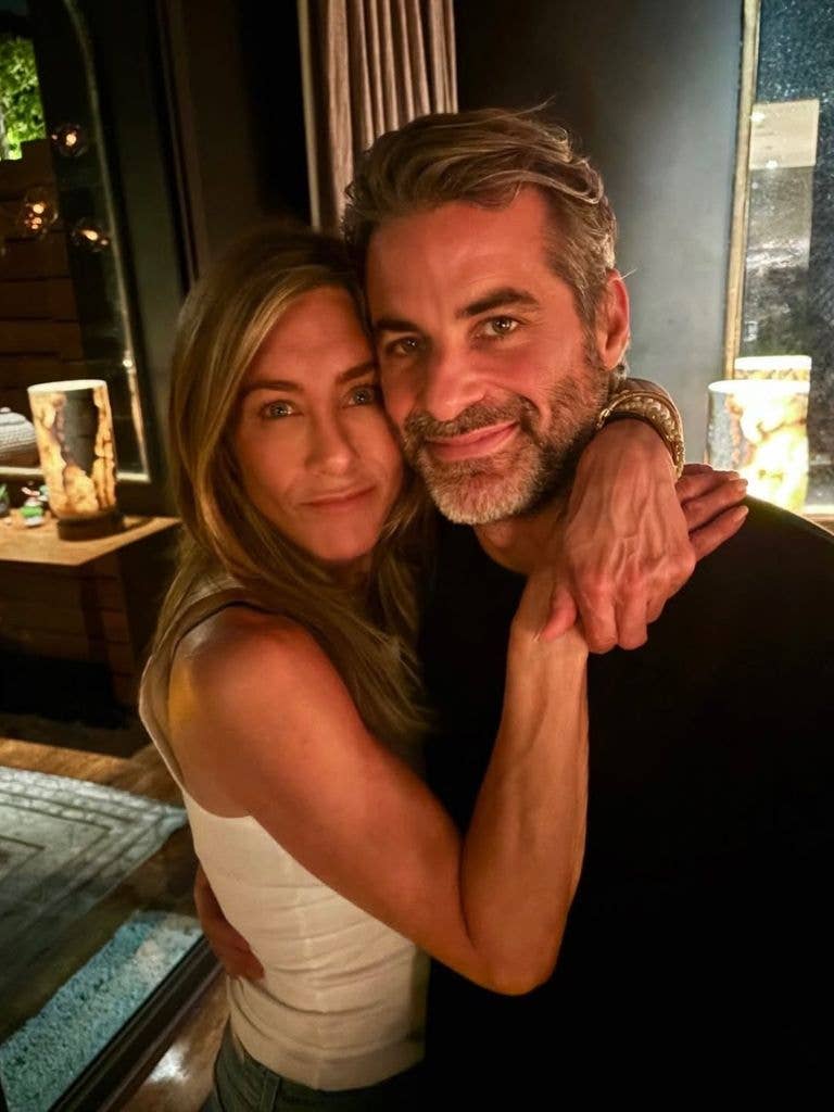 Jennifer Aniston and Jim Curtis pose for a photo, shared on Instagram