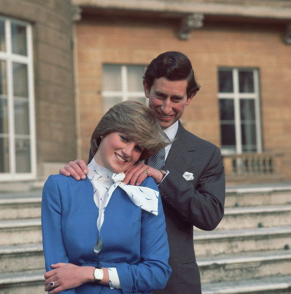 Prince Charles and Lady Diana Spencer pose for photographers at Buckingham Palace after the announcement of their engagement.