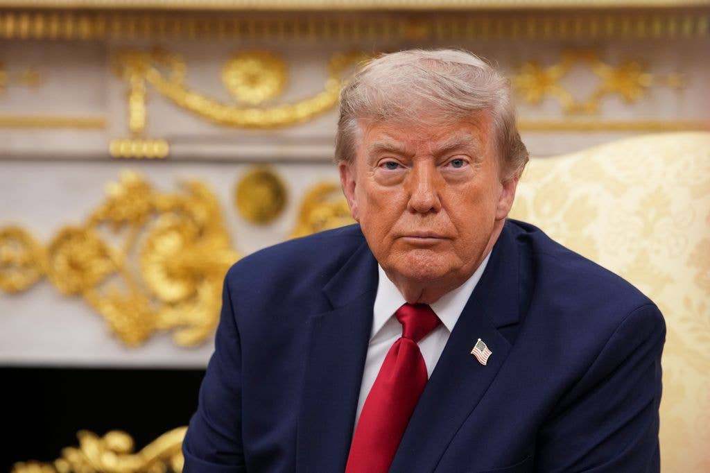 Donald Trump looks on during a bilateral meeting with the Prime Minister of Iraq Ali al-Zaidi, in the Oval Office of the White House on July 14, 2026 in Washington, DC. In his first foreign trip since taking office, Zaidi is visiting the White House to hold talks on U.S. investment into the Iraqi economy amid instability in the region. (Photo by Andrew Harnik/Getty Images)