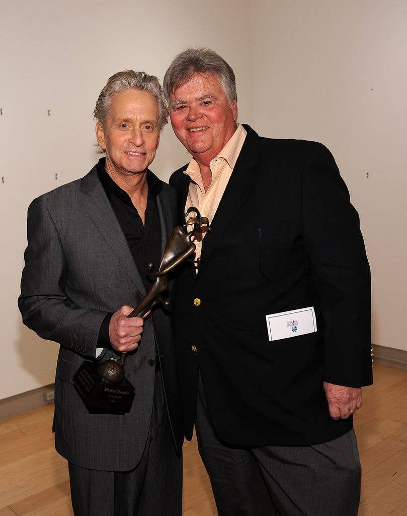 Actor Michael Douglas (L) and producer Joel Douglas attend the Icon Award Presentation during the 22nd Annual Palm Springs International Film Festival at the Annenberg Theatre on January 13, 2011 in Palm Springs, California.