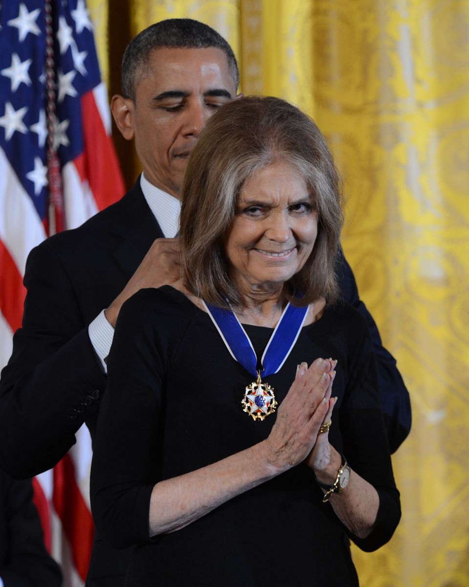 President Barack Obama awards the 2013 Presidential Medal of Freedom to American feminist journalist and social political activist Gloria Steinem.