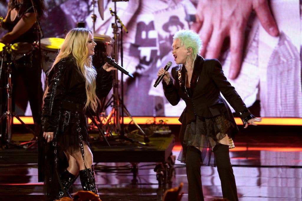 Avril Lavigne and inductee Cyndi Lauper perform onstage at the 2025 Rock & Roll Hall Of Fame Induction Ceremony at Peacock Theater on November 08, 2025 in Los Angeles, California.