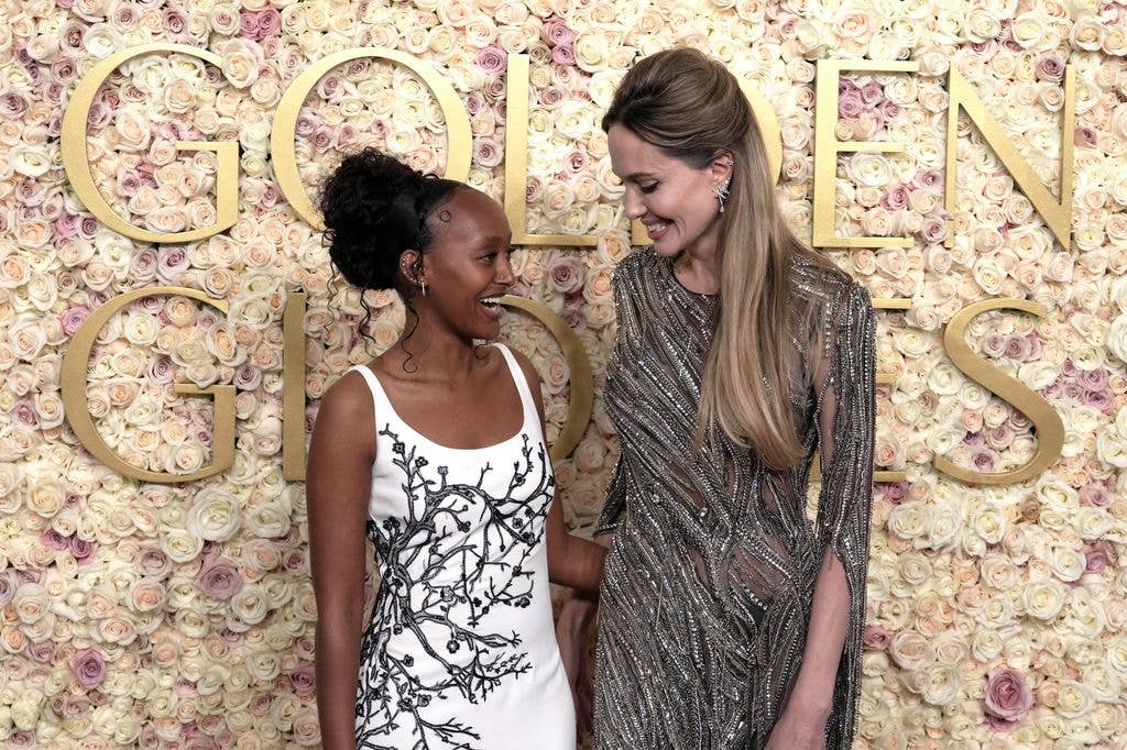 Zahara Jolie and Angelina Jolie attend the 82nd Annual Golden Globe Awards at The Beverly Hilton on January 05, 2025 in Beverly Hills, California