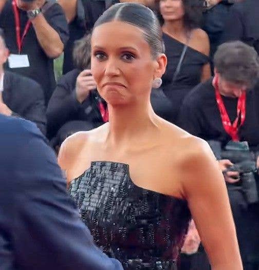Nina Dobrev pulling a face Venice International Film Festival red carpet