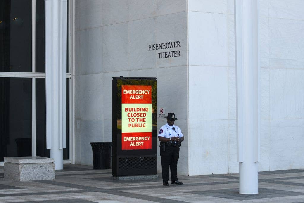 SEPTEMBER 15, 2026: A security officer guards the entrance area at the John F. Kennedy Center for the Performing Arts in Washington, D.C. September 15, 2026, where the center's board voted today to close the main building. Hours earlier, a judge had blocked efforts to add President Donald Trump's name to the venue building again